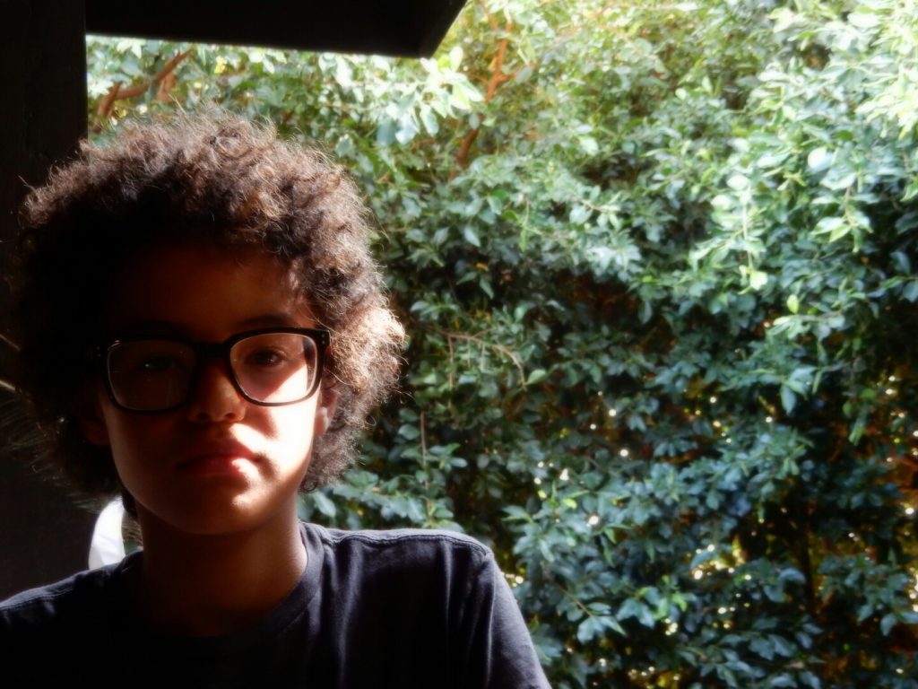 Young boy wearing prescription eyeglasses